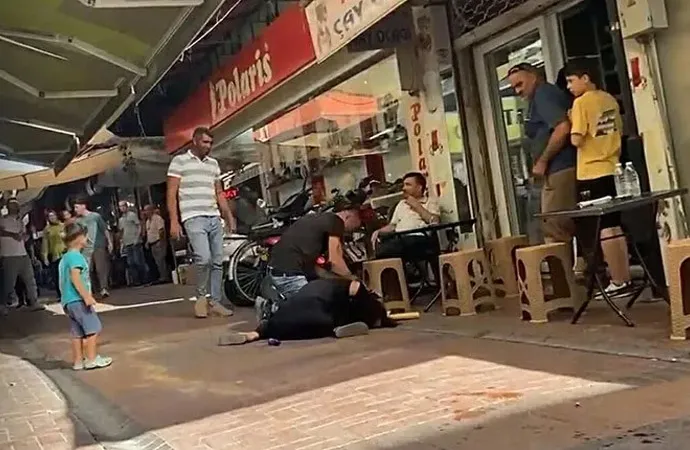 DEMİR ÇUBUKLA SOKAK ORTASINDA DARP EDİLEN HAMİLE KADIN BEBEĞİNİ ALDIRACAK