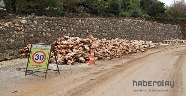 HÜSEYİNLİ MAHALLESİ’NE TAŞ DUVAR